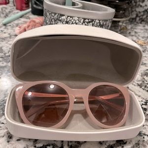 Michael Kors sunglasses.